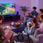 Engaging scene of friends using trending tech gadgets, including Bluetooth devices, in a modern living room atmosphere.